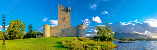Idyllic landscape of Ross Castle in the Killarney National Park in Ireland. Travel by car through the Ring of Kerry.