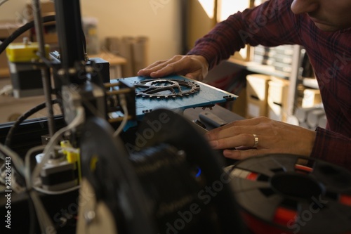 Mechanic working on die machine