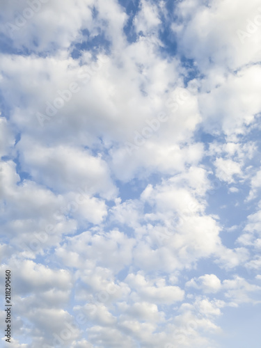 Clouds cumulus in blue sky  illuminated and white  transmit peace and tranquility  calming the spirit.