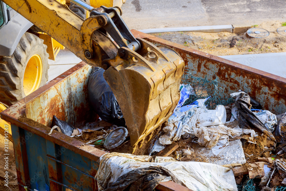 Fototapeta premium refuse disposal with excavator shovel construction site