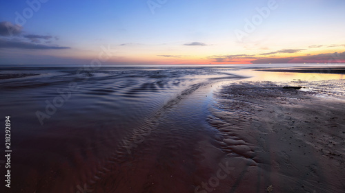 Long exposure shot of Beach sunset at Eastern Thailand .