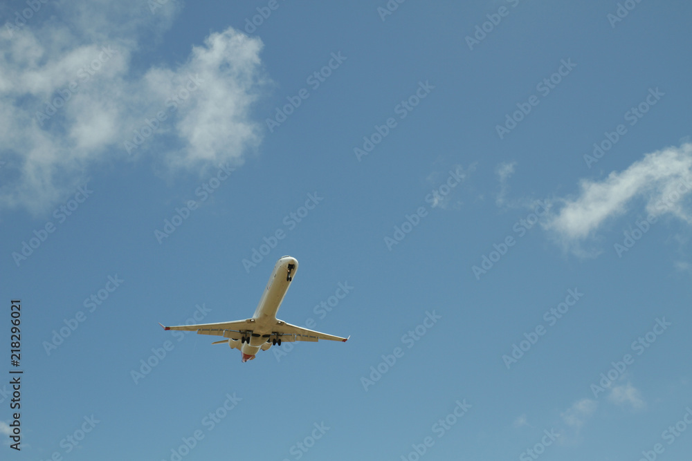 Airplane against sky