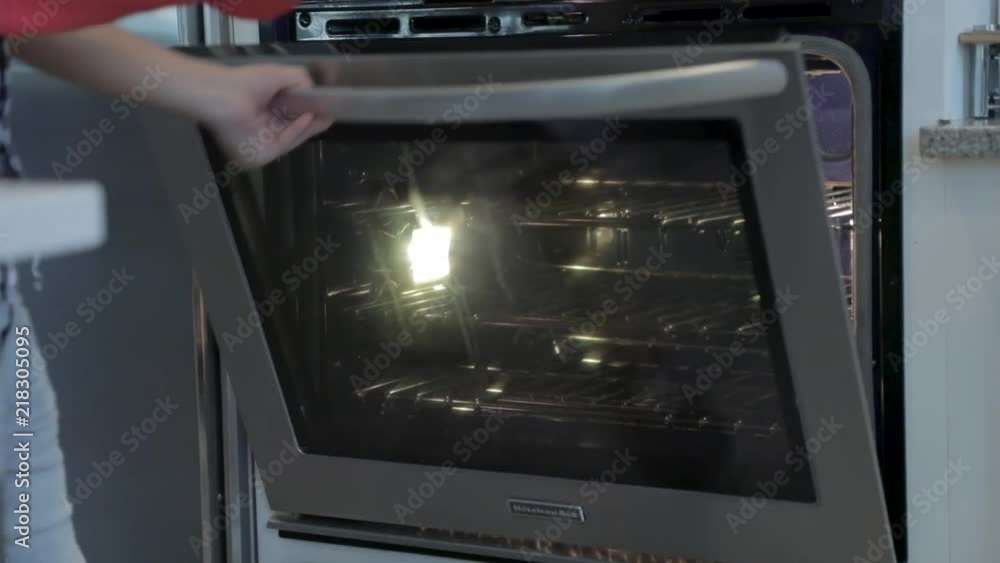 Taking Tray of Food Out of Oven Taking Tray of Food Out of Oven