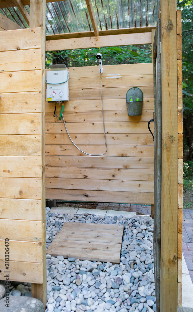 Outdoor shower stall at a glamping site Stock Photo Adobe Stock
