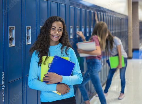 Canvas Print Junior High school Student smiling in a school hallway