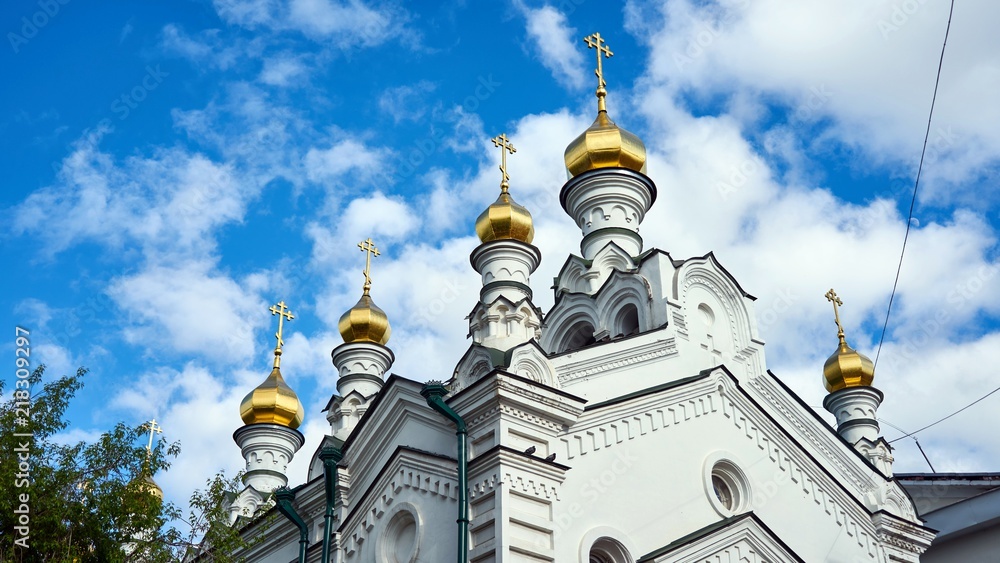 Church on cloudy sky background Tomsk Russia