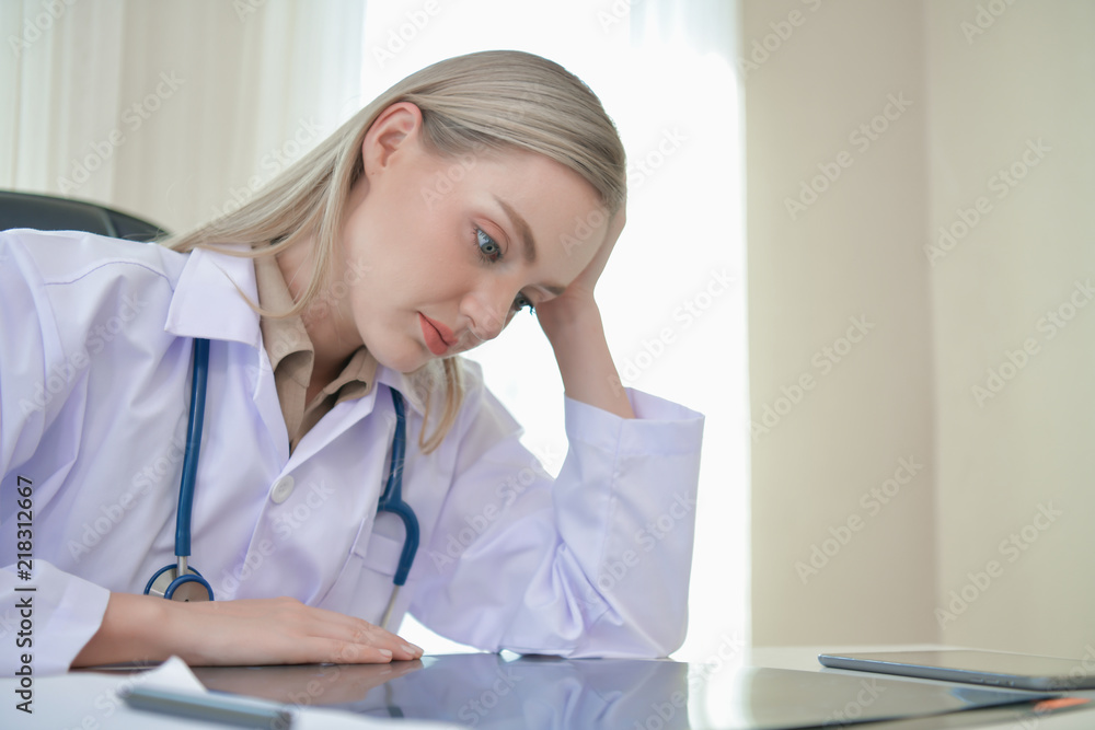 Doctor Concept. Doctors are making serious faces. The doctor is stressed about work. The doctor is unhappy and serious. Doctors are thinking of treating patients. Doctor Concept. Doctors are making serious faces. The doctor is stressed about work. The doctor is unhappy and serious. Doctors are thinking of treating patients.
