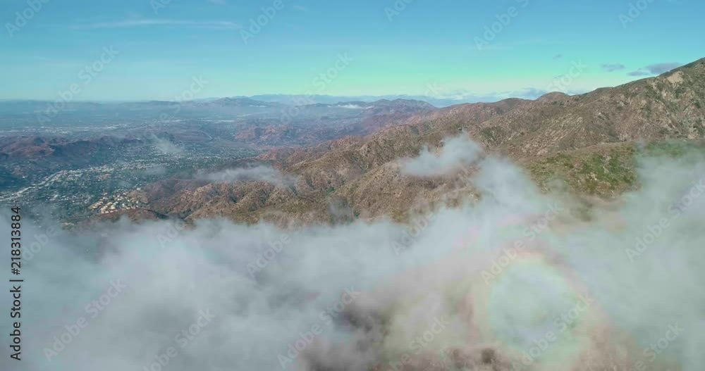 Mountains in the clouds viewed from a drone Mountains in the clouds viewed from a drone