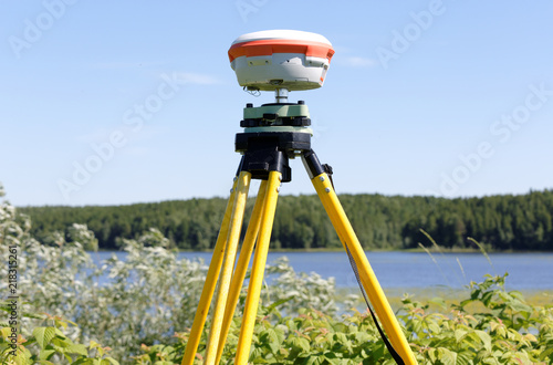 GNSS geodetic receiver works autonomously in the field photo