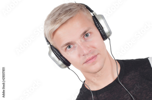 Man in headphones lissening music photo