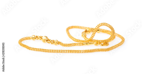 Photos Golden necklace isolated on white background