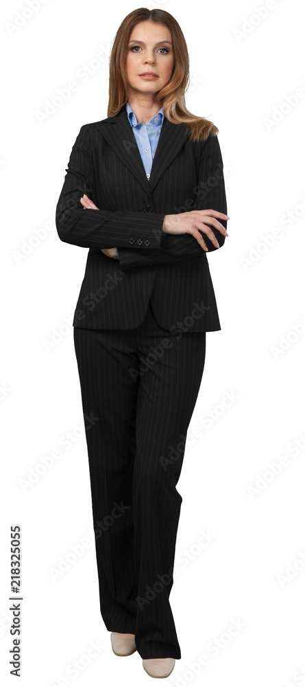 Businesswoman Standing With Arms Folded - Isolated Businesswoman Standing With Arms Folded - Isolated