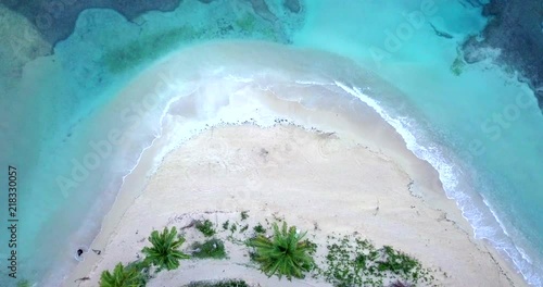 Spectacular flight over Playa Bonita in Dominican Republic. Amazing camera angle. photo