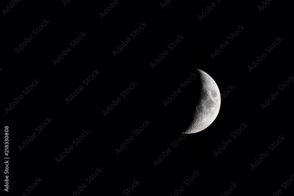 waxing crescent moon in a black night sky waxing crescent moon in a black night sky