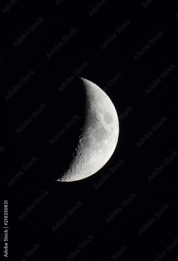 waxing crescent moon in a black night sky waxing crescent moon in a black night sky
