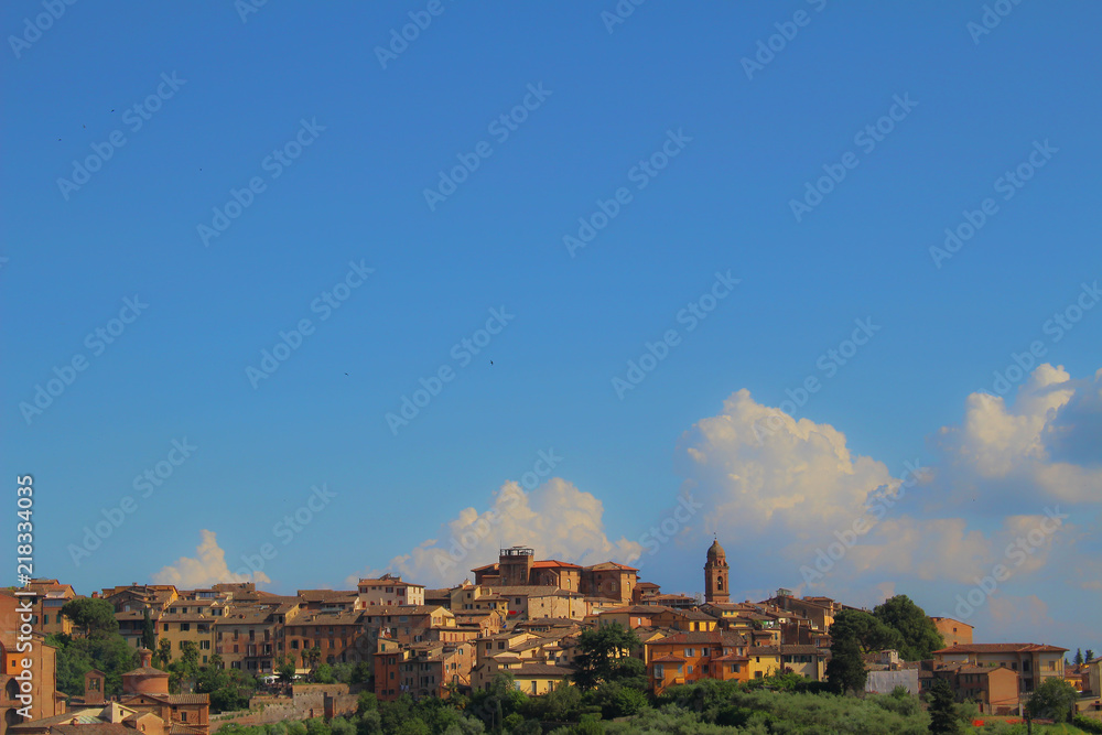 A cityscape view of the picturesque old town of Siena, Italy