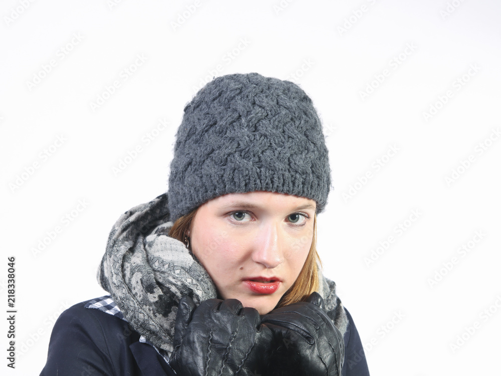 Young woman with grey woolen cap Young woman with grey woolen cap