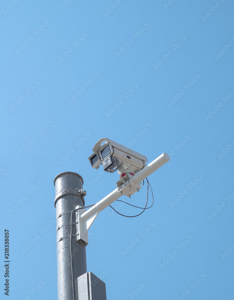 outdoor camcorder surveillance camera on the pillar summer day outdoor camcorder surveillance camera on the pillar summer day