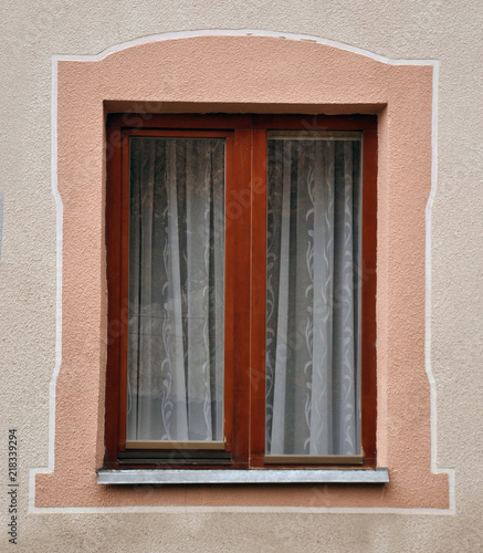 View from the street on the metal-plastic windows