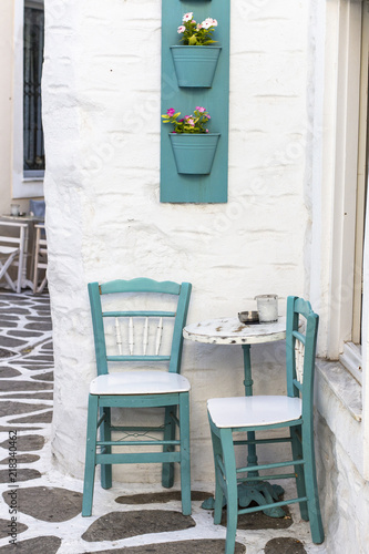 Little corner on the street with chairs and a table