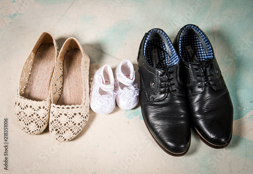 Shoes for the whole family, lined up.