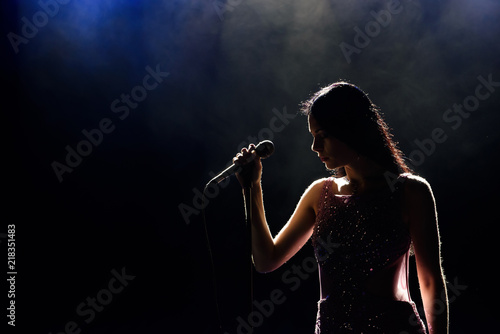 Singer woman on stage photo