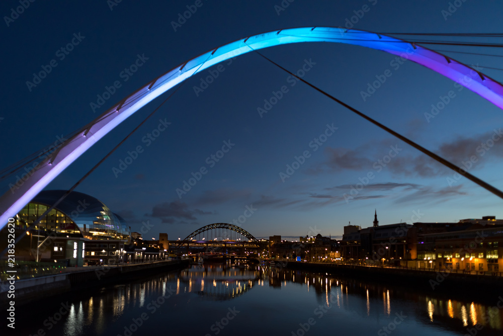 Gateshead Millennium Bridge and Tyne Bridge over the River Tyne