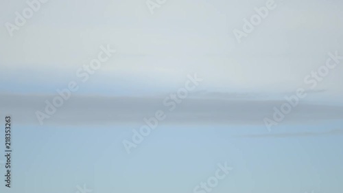 Grey cloud moves among two colour of sky