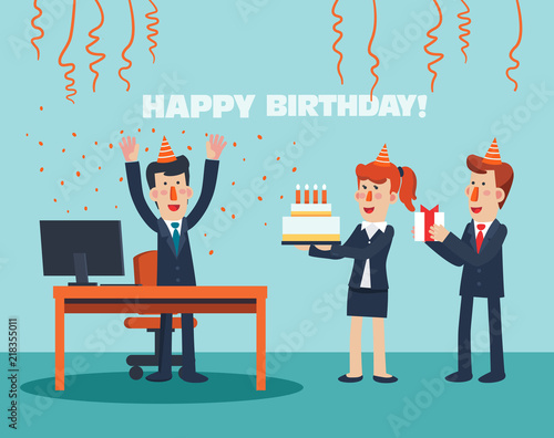 Business people celebrating a birthday in office