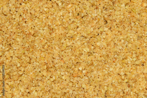 Mass of crushed apples fruits as natural background.