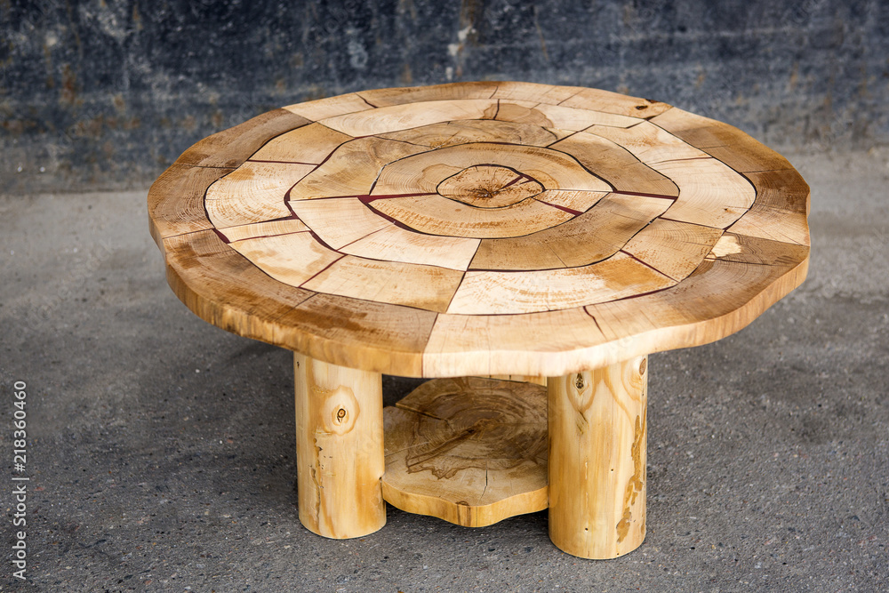 Coffee table made of natural wood and epoxy resin