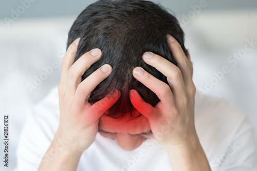 Brain diseases problem cause chronic severe headache migraine. Male adult look tired and stressed out depressed, having mental problem trouble, medical concept photo