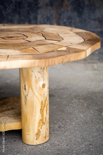 Coffee table made of natural wood and epoxy resin
