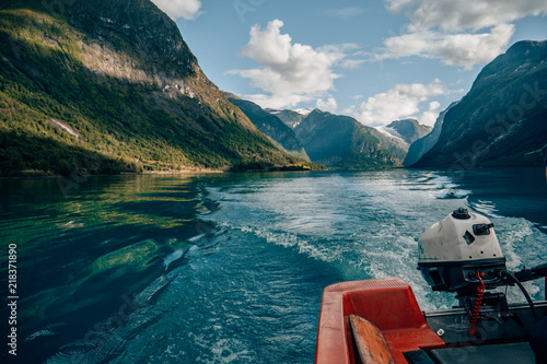 Motorboat on Lovatnet in Norway photo