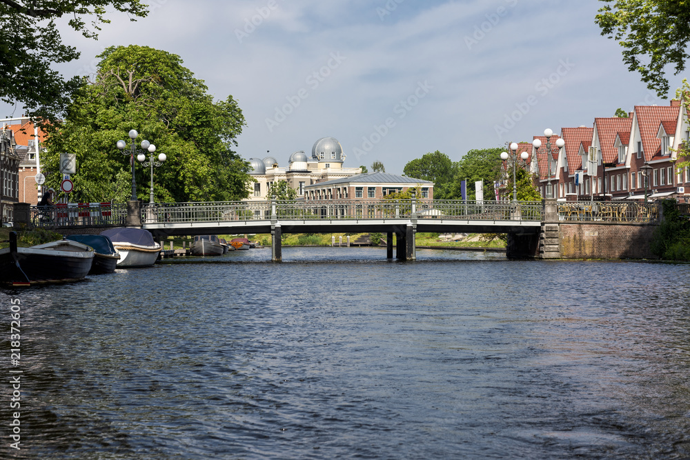 One of the canals in Leiden in Holland. In the distance can be seen the Observatory