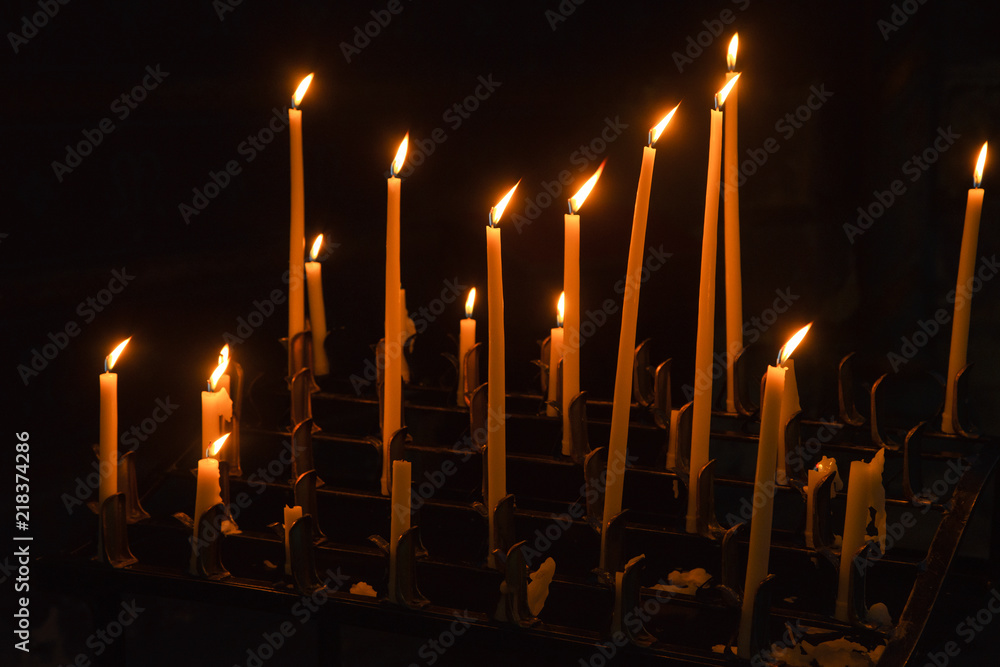 High candles in catholic cathedral High candles in catholic cathedral