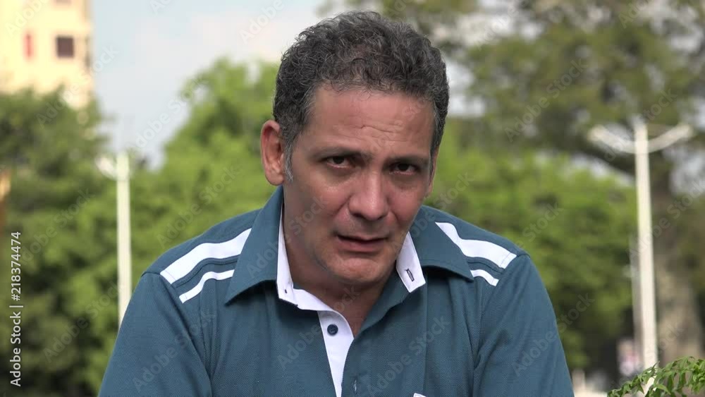 Adult Hispanic Man Crying