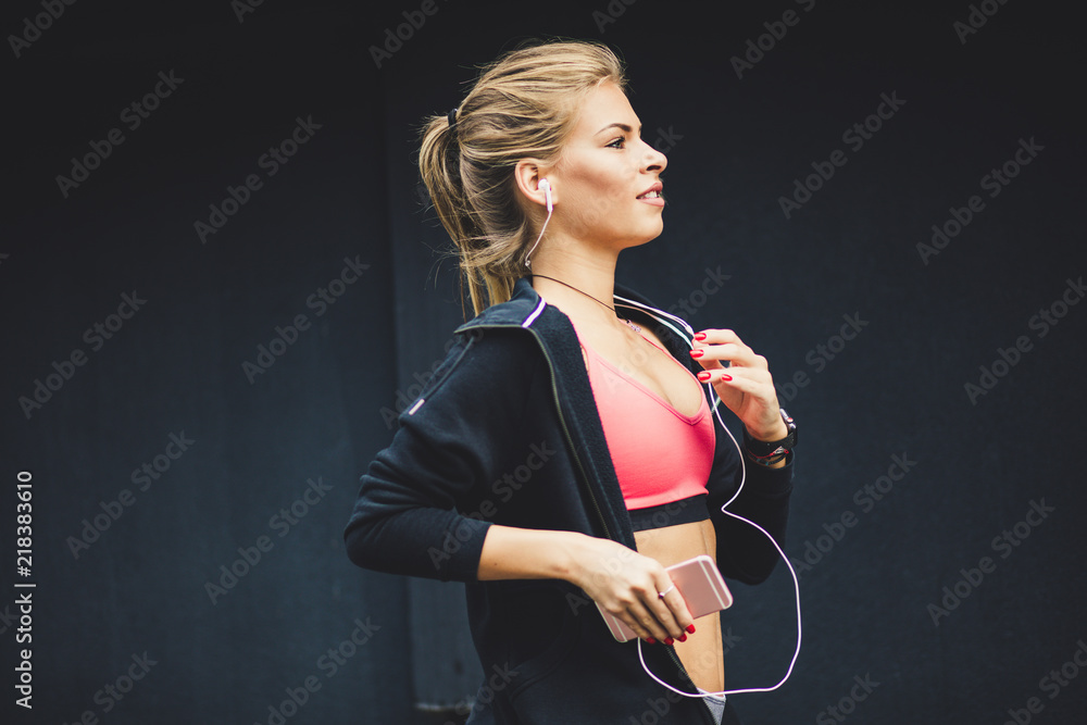 Young blonde women running. Close up. Copy space.