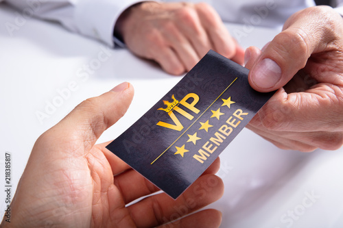 Cuadro en lienzo Businessperson Giving VIP Card To His Partner