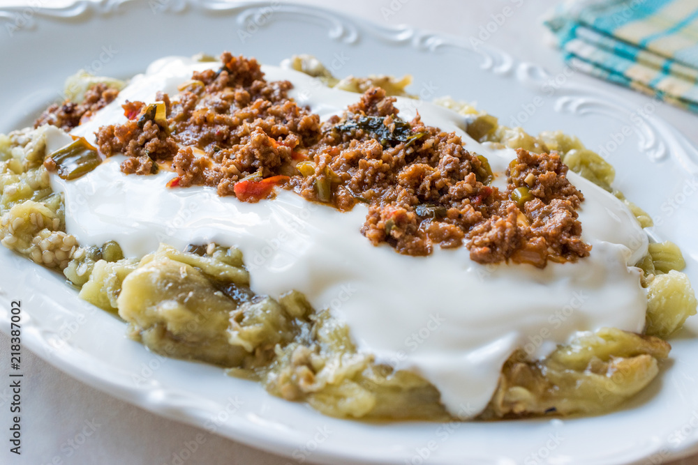 Turkish Ali Nazik Kebab with Yogurt, Minced Meat and Roasted Eggplant or Aubergine / Kebap. Turkish Ali Nazik Kebab with Yogurt, Minced Meat and Roasted Eggplant or Aubergine / Kebap.