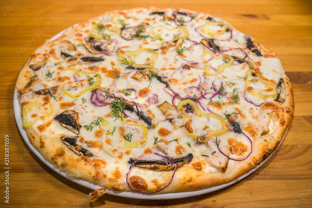 Very tasty fresh pizza from the pizzeria. Various fillings