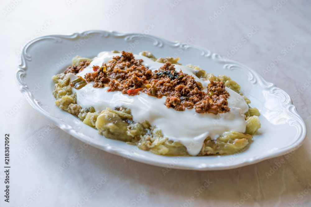 Turkish Ali Nazik Kebab with Yogurt, Minced Meat and Roasted Eggplant or Aubergine / Kebap. Turkish Ali Nazik Kebab with Yogurt, Minced Meat and Roasted Eggplant or Aubergine / Kebap.
