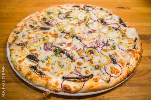 Obraz na płótnie Very tasty fresh pizza from the pizzeria. Various fillings w salonie