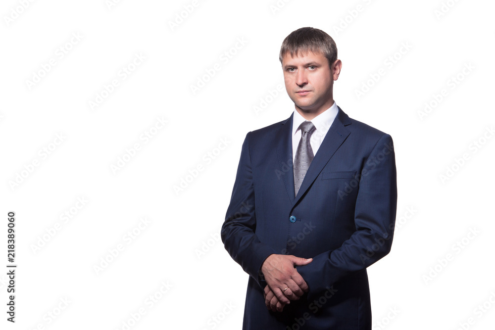 Young handsome businessman with beaming smile pointing with finger Young handsome businessman with beaming smile pointing with finger