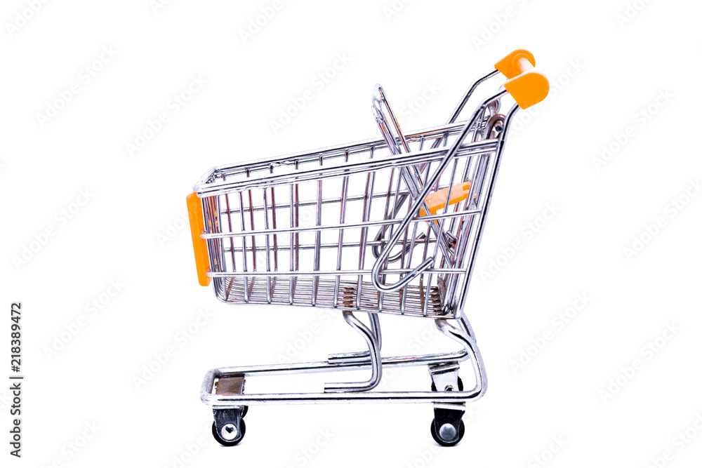 Miniature metal shopping cart with orange elements shot against a white background