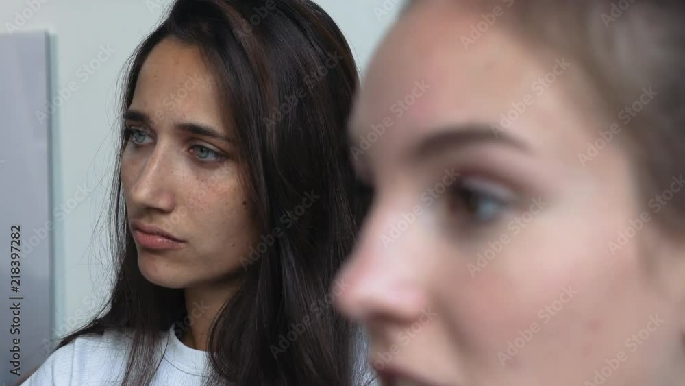 Faces of Two Young Women Talking Faces of Two Young Women Talking