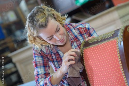 womanan working in upholstery workshop photo