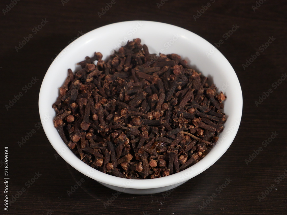 dry cloves on white background, Dry Clove on Wooden Background, Clove, Clove in Bowl dry cloves on white background, Dry Clove on Wooden Background, Clove, Clove in Bowl