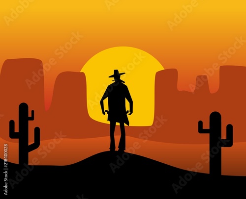 Wild west gunslinger. Background the desert.