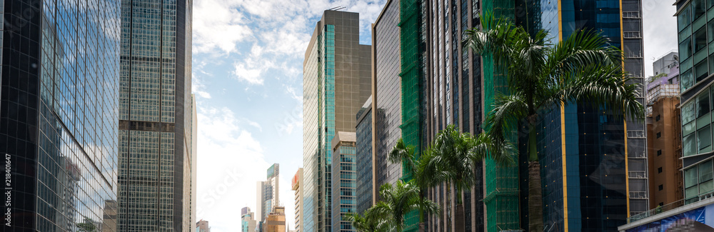 Modern office buildings in Central Hong Kong sun flare sunset